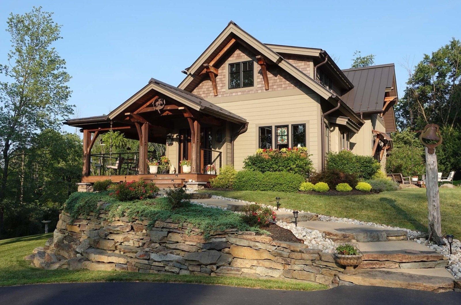 Craftsman timber frame estate with exposed heavy timber and stone retaining walls, Atherton California