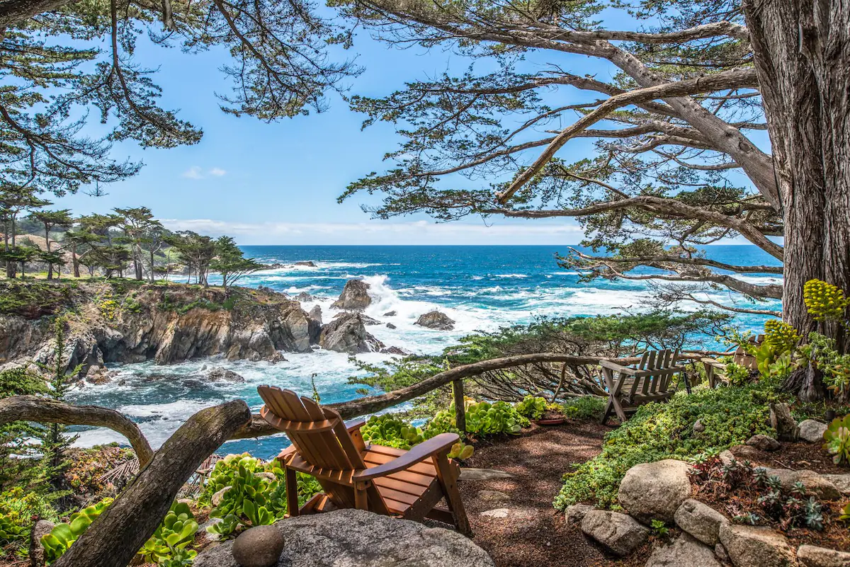 Hand-built stone estate with Monterey cypress above the Pacific, Carmel-by-the-Sea California