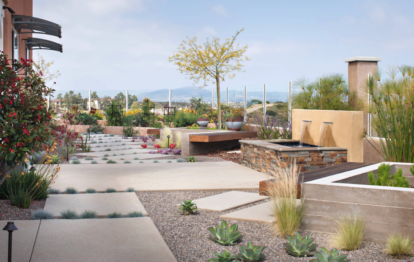 Xeriscape garden with stone water feature
